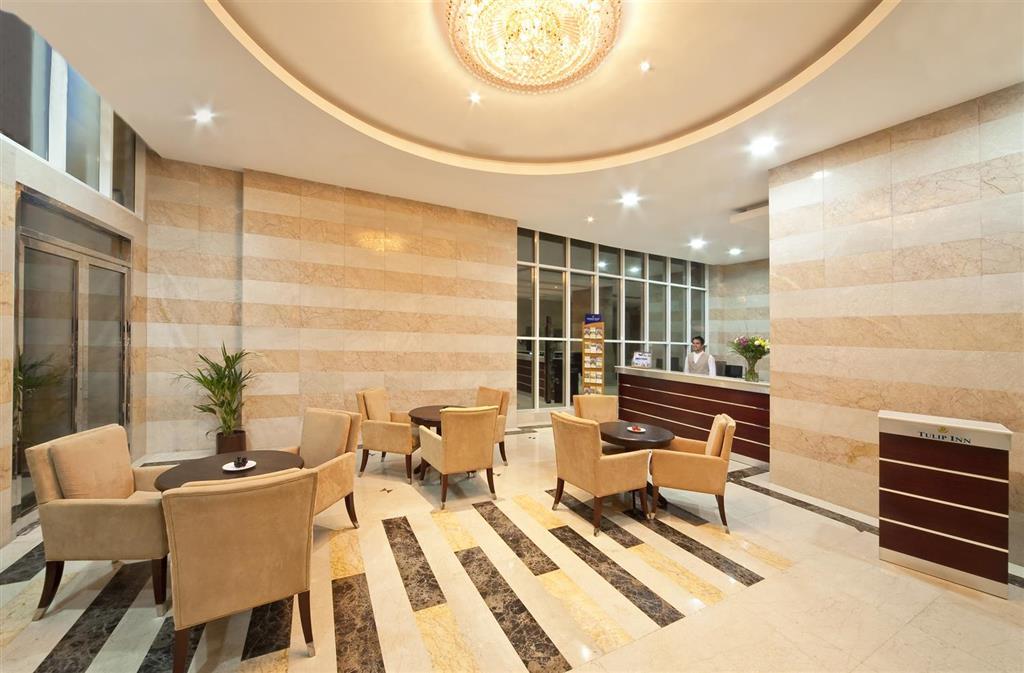 Tulip Inn Ajman. Sharjah Royal Tulip Hotel Apartment. Отель Tulip Inn dar в Медине. Tulip Inn Gold ресепшн.